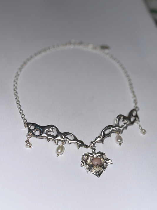 Angelica 443, Bionic Rococo heart choker necklace in sterling silver with pink opal, gothic tracery, lace and angel wing motif, handcrafted by Sooz Artifact in Seoul